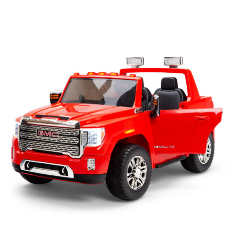 The Red 2x12V Licensed 4WD GMC Sierra Kids Ride On Car features an open drivers side door, detailed grille, side mirrors, large wheels, working headlights, and an open-top design with visible seats for ultimate fun.
