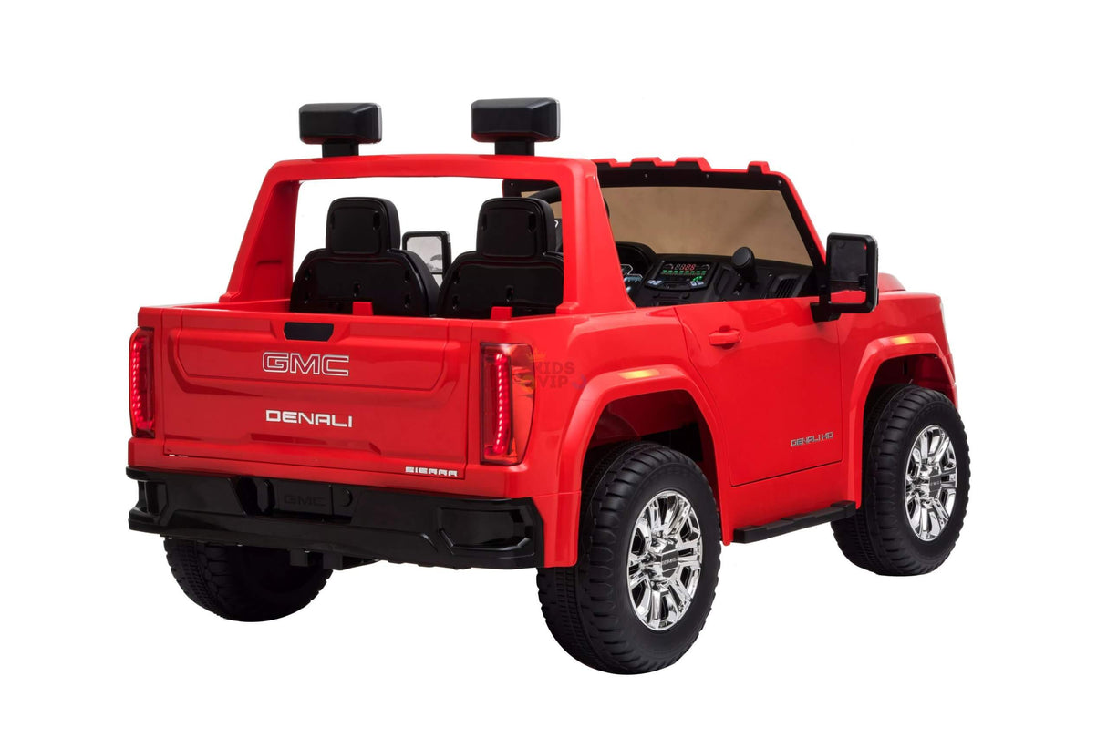 The Red 2x12V Licensed 4WD GMC Sierra Kids Ride On Car with RC features realistic wheels, side mirrors, branding, two seats, and a remote control for safety, offering children a true vehicle experience.