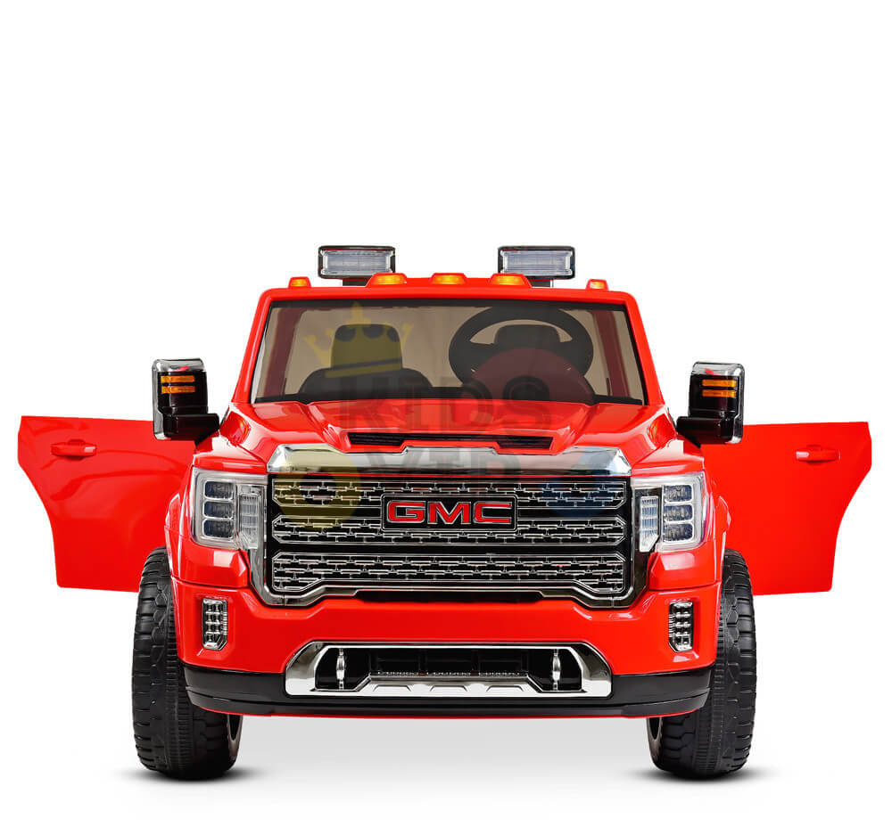 The Red 2x12V Licensed 4WD GMC Sierra Kids Ride On Car with RC features open front doors, a detailed grille, headlights, large black wheels, and a steering wheel for an adventurous experience.