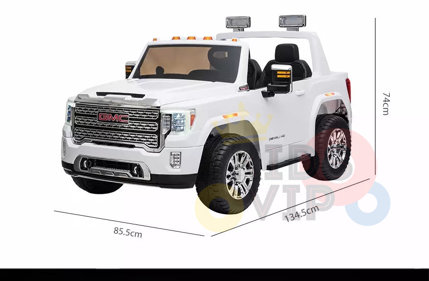 The blue two-seater licensed 4WD GMC Sierra 2x12V kids ride-on car, featuring mirrors, headlights, and grille detailing, measures 134.5 cm (L) x 85.5 cm (W) x 74 cm (H). It offers leather seats for a realistic and adventurous playtime experience for young drivers.