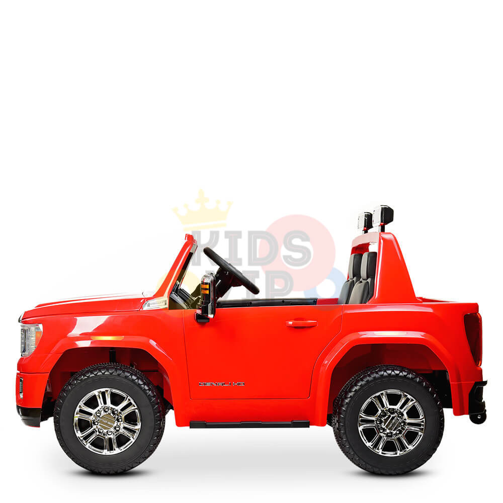 The Red 2x12V Licensed 4WD GMC Sierra Kids Ride On Car features black wheels, open sides, a steering wheel, side mirrors, two seats, and comes with a remote control for added convenience and fun.