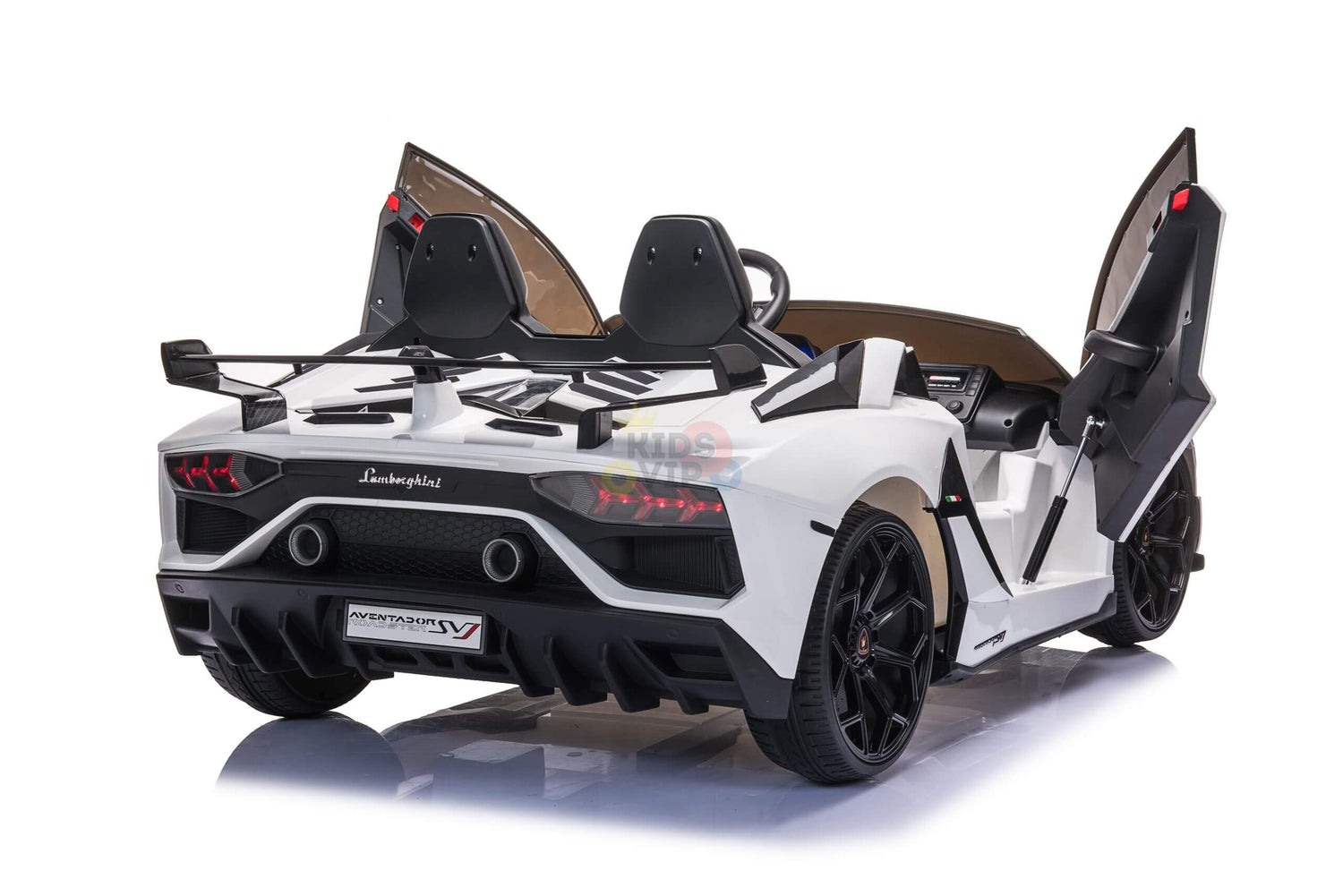 The Upgrade Your Ride with the White 24V Lamborghini SVJ Drifting Kids Ride on Car features a sleek design with butterfly doors, black seats, large drifting wheels, detailed rear lights, and sits on a reflective surface highlighting its sporty look.