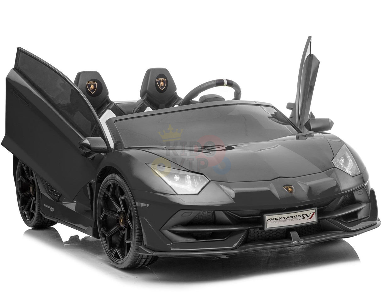 The Black 24V Lamborghini SVJ Ultimate Drifting Car is a sleek toy car with upward-opening doors, drifting wheels, and detailed rims, modeled after the Aventador. It features sporty design elements with logo accents on the front and seats, plus a reflective floor—ideal for kids.