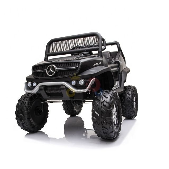 The Black Official 12V Mercedes Unimog Junior 4X4 Kids Ride On UTV features large off-road tires, a prominent Mercedes logo on the grille, and a sturdy roll bar. Designed for children, its powered by a 12V battery and comes with remote control.