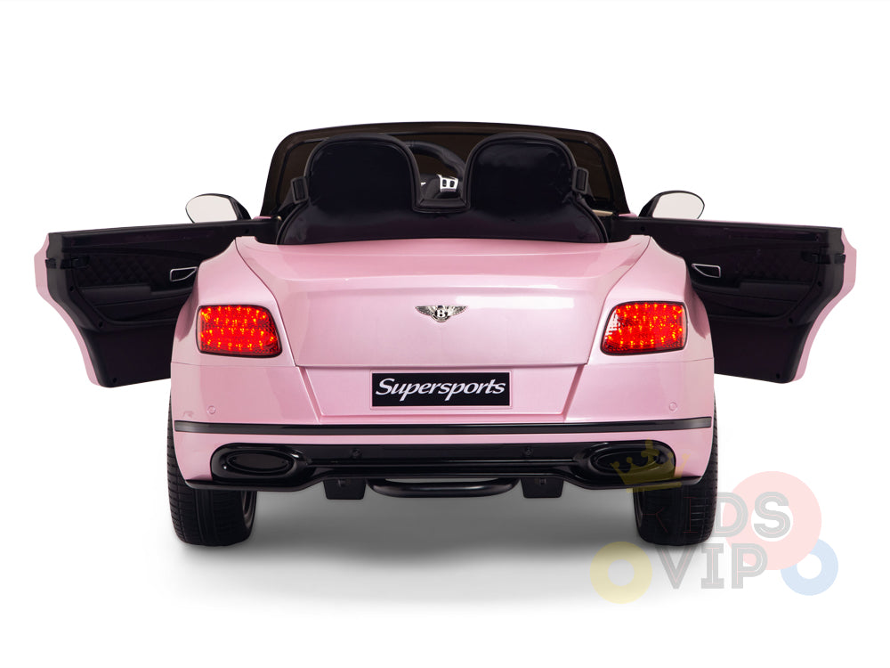 The rear view of the Pink 12V Bentley GTC Kids Licensed Ride On Car features open doors and visible taillights, with Supersports on the license plate. This Bentley Ride On with rubber wheels and remote offers excitement for little drivers.
