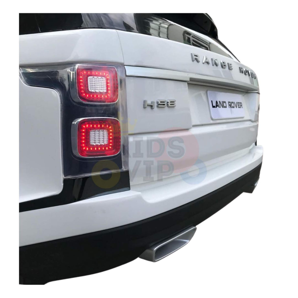 Close-up of the rear on a 24V White on White Edition Range Rover Kids Ride On Car, highlighting taillights, badge, and exhaust pipe. The Land Rover detail emphasizes its authentic design.
