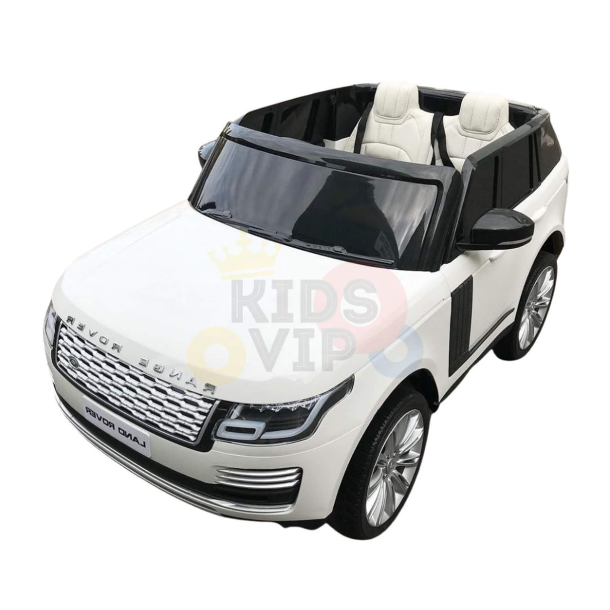 The 24V White on White Edition Range Rover Kids Ride On Car boasts luxury with its white body, black interior, silver detailing, and realistic wheels. Featuring two seats and ride-on technology, it includes a shiny grille and subtle Kids VIP watermark.
