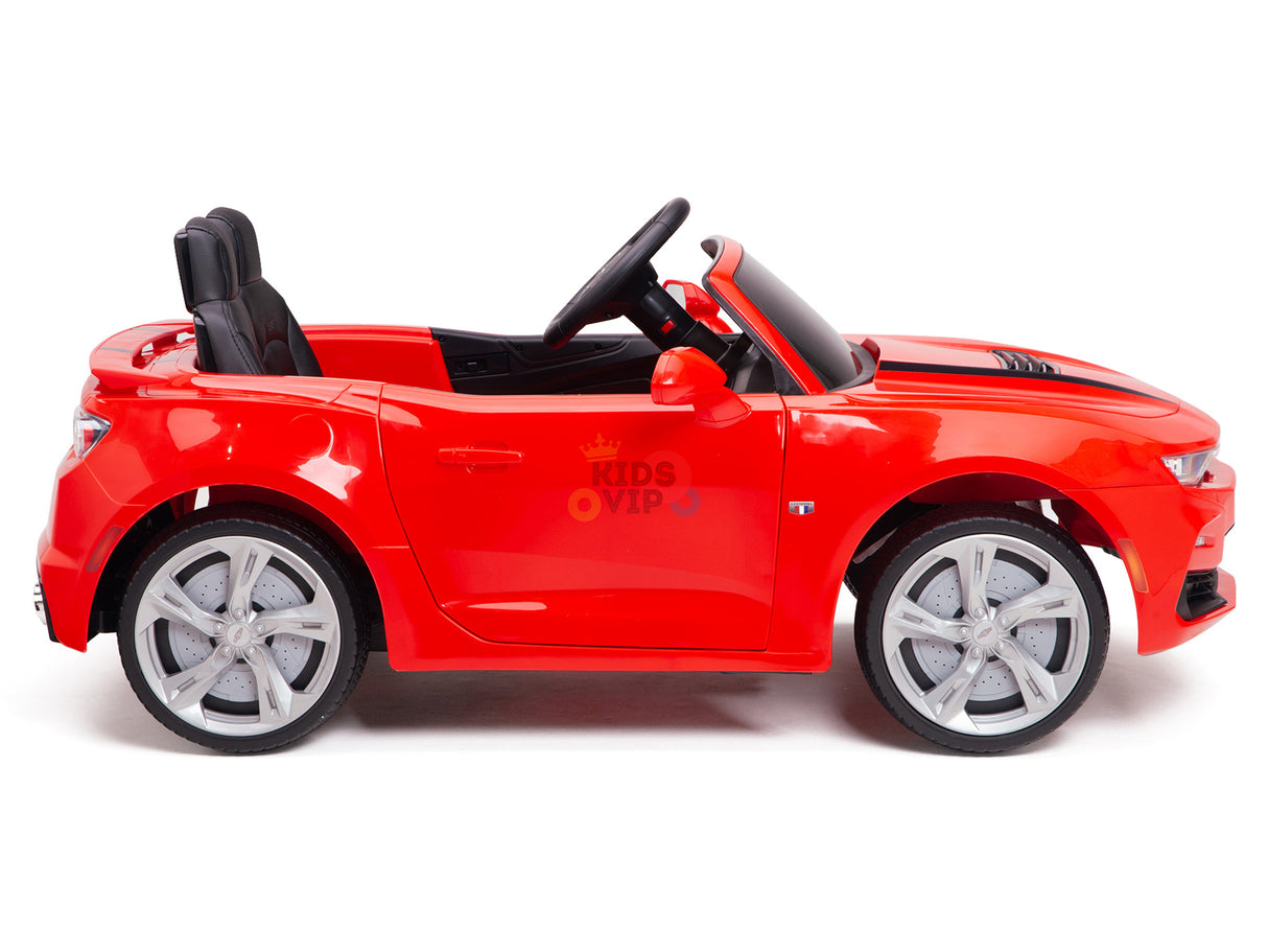 The Red 12V Official Sport Chevrolet Camaro Kids and Toddlers Ride-on Car features black seats, a steering wheel, large silver wheels, and an open-top design. Powered by a 12V battery with remote control, the image shows the cars side profile.