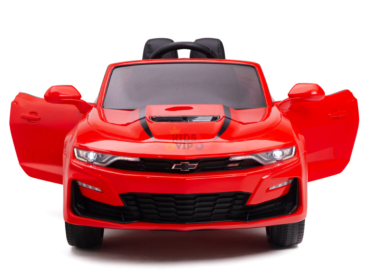 The Red 12V Official Sport Chevrolet Camaro Kids and Toddlers Ride-on Car features openable doors, black seats, and a prominent grille. This mini sports car is perfect for little drivers and can be remotely controlled for added fun.