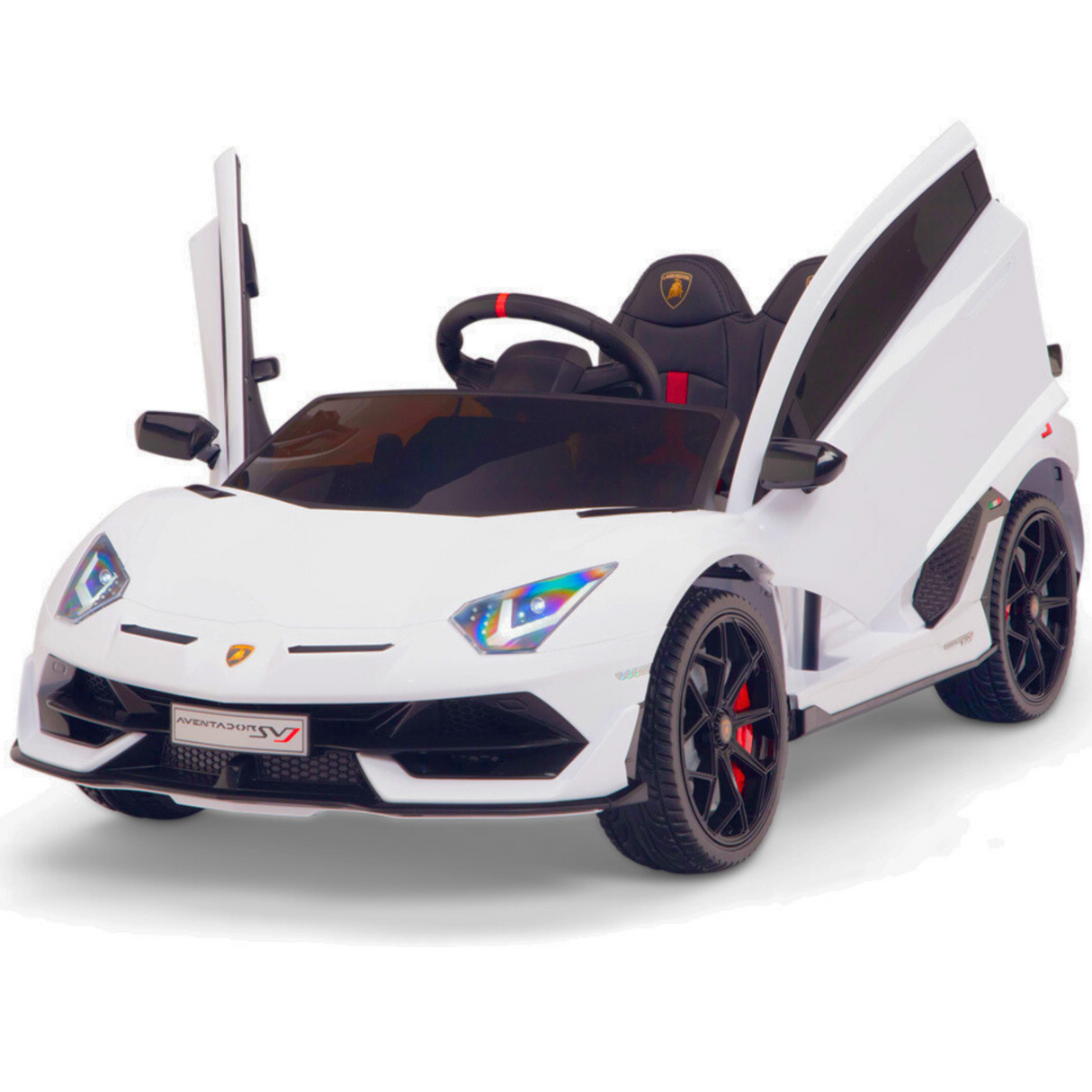 The White 12V Lamborghini SVJ Sport Kids Ride On Car boasts vertically opening doors, detailed headlights, sleek styling, and black and red rubber wheels. It features a visible steering wheel and sits against a plain white background.