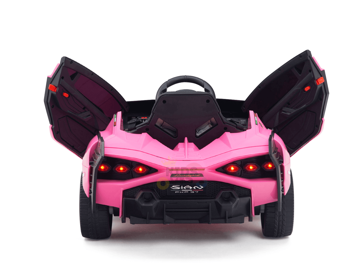 The Official 12V Sport Edition Lamborghini Sian Kids Ride-On Car boasts pink butterfly-style doors, vibrant red taillights, a steering wheel, and the prominent SISIGAD logo on a white backdrop. Powered by a 12V battery, it echoes the mini luxury design perfectly.