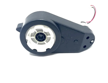 A black gearbox for a 24V 4WD ride-on car, with visible wiring and a central gear mechanism.