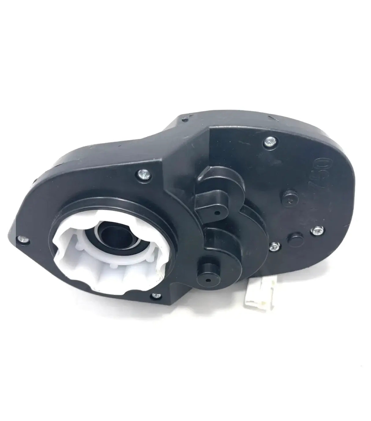 The 24V 2WD Challenger UTV Complete Gearbox is a black and white modular mechanical component with gears, slots, screws, and a white internal section, similar to parts used in ride-on cars. The background is plain white.