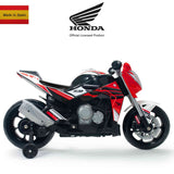 The Red INJUSA 12V Honda Naked Edition Ride On Bike is a kids motorcycle in red, black, and gray with training wheels. It features the iconic Honda logo at the top center and a Made in Spain tag on the top left corner, perfect for young riders.