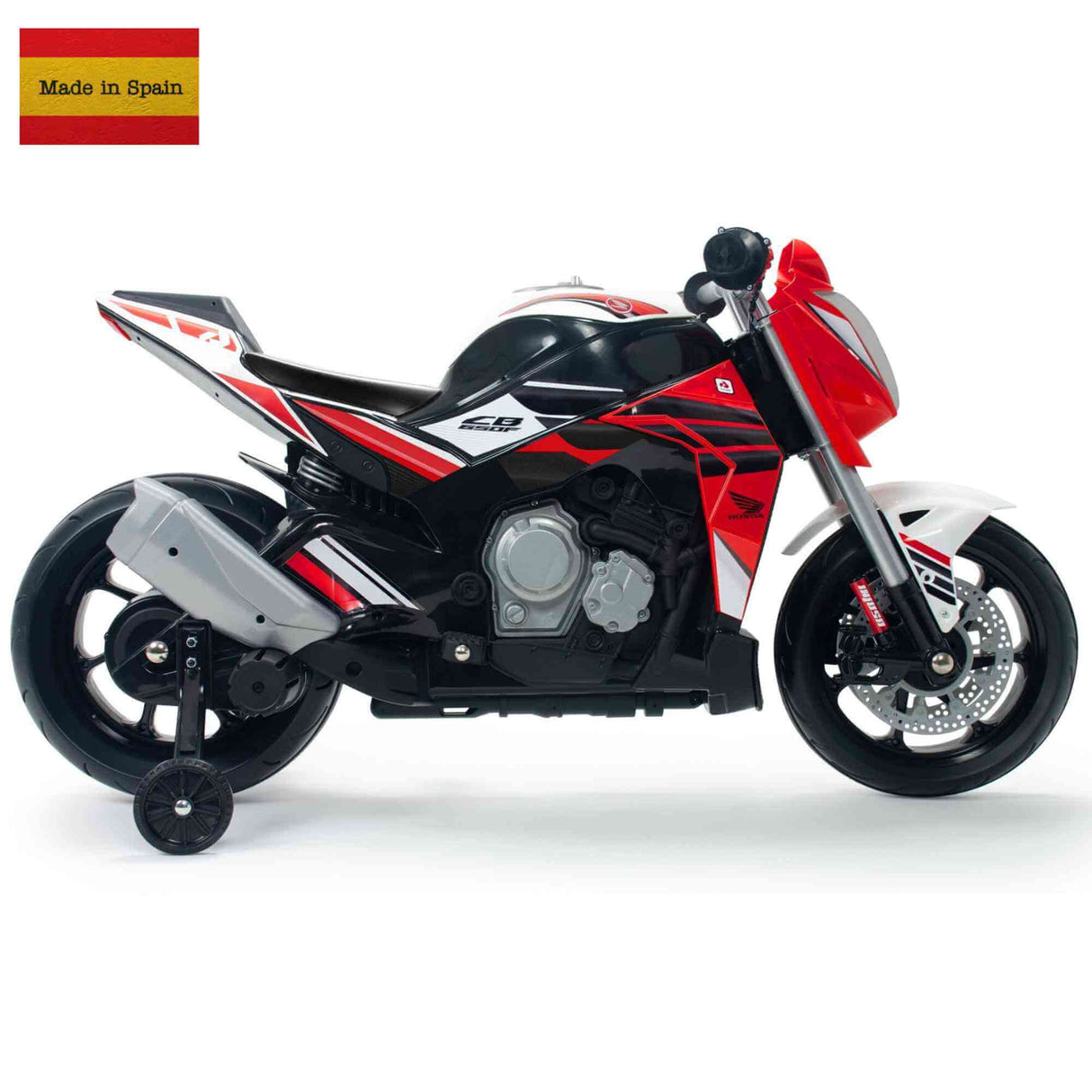 The INJUSA 12V Honda Naked Edition Ride On Bike for kids showcases a vibrant red, black, and white design with training wheels and intricate details. A Spanish flag and Made in Spain text adorn the top left corner, offering young riders an exciting adventure.