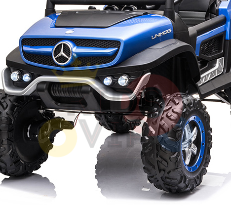 The Blue Official 12V Mercedes Unimog Junior 4X4 Kids Ride On UTV combines an off-road design with rugged tires, chrome details, LED lights, and a three-pointed star emblem. It includes a Remote Control for enhanced enjoyment and safety.