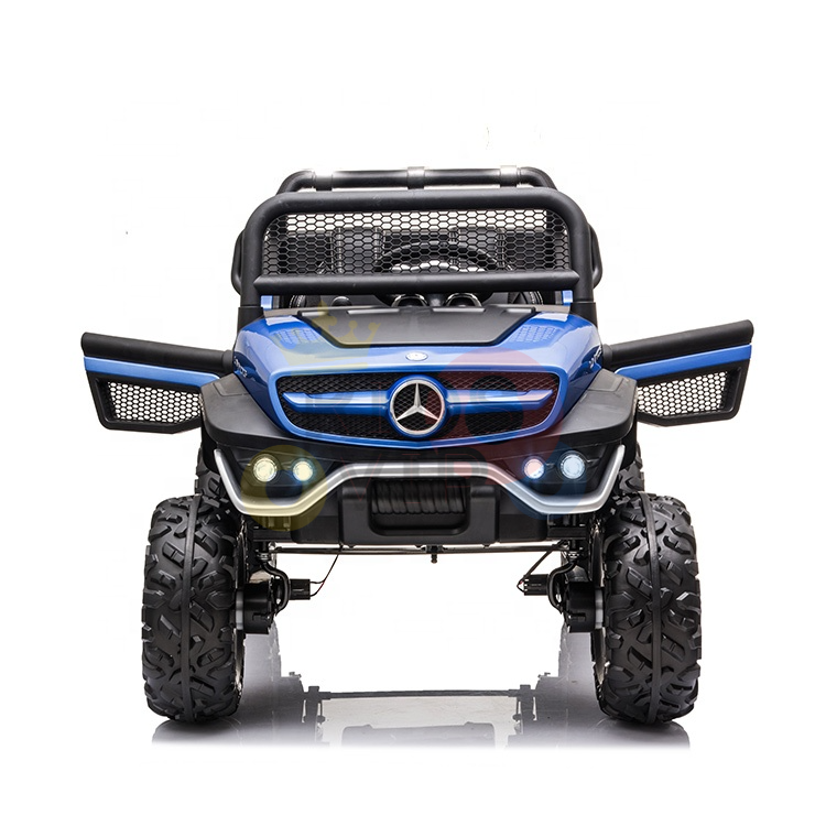 The Blue Official 12V Mercedes Unimog Junior 4X4 Kids Ride On UTV features large tires, a logo-adorned grille, and mounted headlights. Designed for kids with rugged off-road style, it offers an exciting drive and remote control capability.