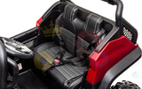 Interior of the Camo 12V/4X4 Official Mercedes Unimog Junior Ride On UTV features dual black leather seats with white stitching and safety harnesses. It displays a striking black and red design, with a left-positioned steering wheel clearly visible.