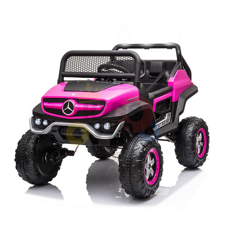 The Pink 12V/4X4 Official Mercedes Unimog Junior Ride On UTV has large rugged wheels, mesh grille, open-top design, headlights, and seating for children. Its perfect for adventurous play and can be controlled with a remote.