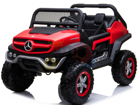The Red 12V/4X4 Official Mercedes Unimog Junior Ride On UTV is a kids ride-on car with off-road tires, mesh grill, and two-seat interior, styled as an adventurous vehicle and features remote control for rugged play.