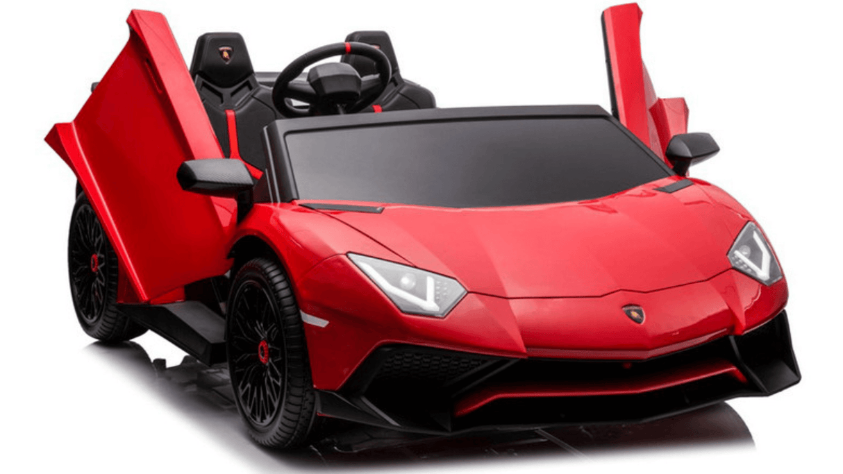 The Red 24V/180W Lamborghini SV Limited XXL Edition is a sleek toy sports car with black accents, upward-opening doors, aerodynamic lines, and detailed interior including a steering wheel and seat. It features black wheels with red trim and can reach speeds up to 10MPH.