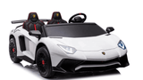 The White 24V/180W Lamborghini SV Limited XXL Edition ride-on toy features black and red accents, eco-leather seats with headrests, a steering wheel, and detailed headlights. Mimicking a sports car design, it reaches speeds up to 10MPH and is set against a plain white background.