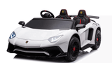 The White 24V/180W Lamborghini SV Limited XXL Edition ride-on supercar features two eco-leather seats with black and red accents, a steering wheel, detailed headlights, visible front grills, and black wheels. It boasts a sleek sports car design with a top speed of up to 10MPH.