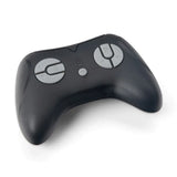 A sleek black ergonomic game controller with four gray buttons labeled A, S, P, and K offers a simple modern design with a smooth surface and rounded edges—ideal for those who love gaming as much as enjoying a ride in a 12V Unimog Remote by KidsVipOnline.