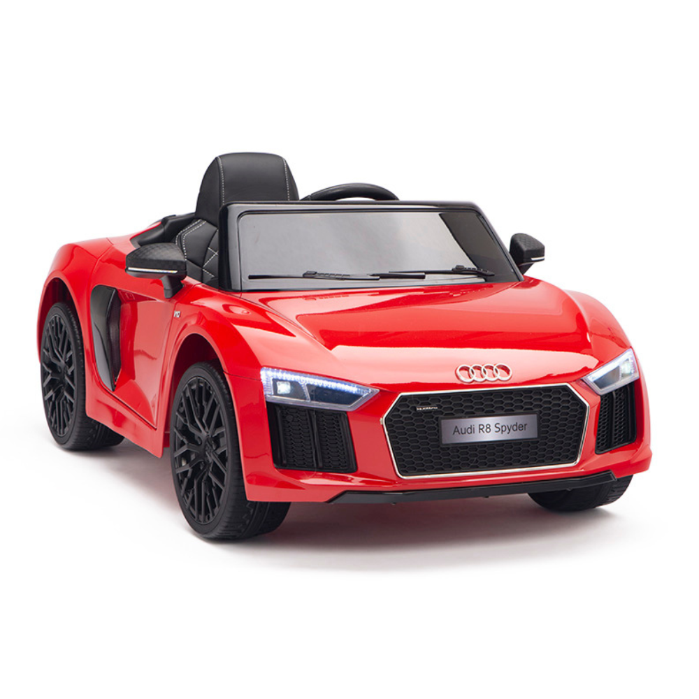 The red 12V Audi R8 Licensed 1-Seater Ride On Car features black details, LED lights, a shiny finish, minimalist dashboard, sleek side mirrors, robust EVA rubber wheels, and a powerful 12V battery set against a white background.