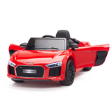 Red 12V Audi R8 licensed ride-on car, features one seat, open doors, black interior, EVA rubber wheels, detailed front lights.