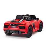 The Red 12V Audi R8 Licensed 1-Seater Ride On Car, designed for kids, resembles an Audi R8 Spyder. It features a realistic steering wheel, detailed rear lights, EVA rubber wheels, and branding elements on the license plate and interior for authenticity.