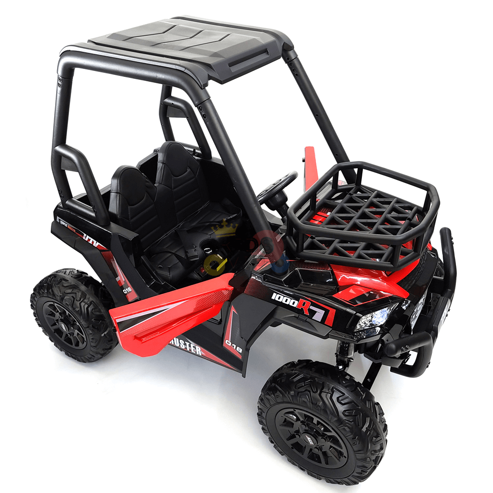 This red and black kids ride-on car, the 24V Edition Golf Buggy UTV, features two seats, rugged wheels, an open roof, grid-like front rack with 1000 RX graphics, a slightly open drivers side door, and includes a parental remote for added safety.