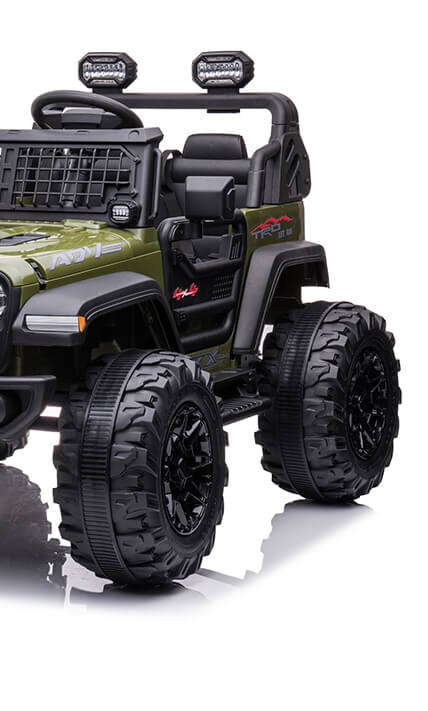 The Green 2 Seater 24v Xtreme 2WD Edition Kids Ride on Truck features large black tires, LED lights, rugged design with a roll cage, open seating, detailed interior, and parental remote control. It has Eva wheels and leather seats, displayed against a plain white background.