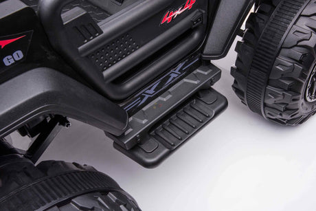 Featuring sturdy side steps and large black EVA wheels, the Black 24V/4WD Xtreme Ride-on Truck boasts leather seats, textured tires, and detailed plastic molding for a realistic off-road look.