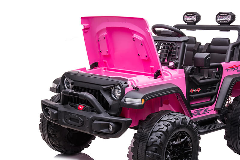 The Pink 24V/2WD Xtreme Edition Ride on Truck features a pink exterior with an open hood and sleek black interior, large black EVA wheels, a black grille, leather seats, and off-road lights on top. This 2-seater toy jeep stands out against the plain white background.