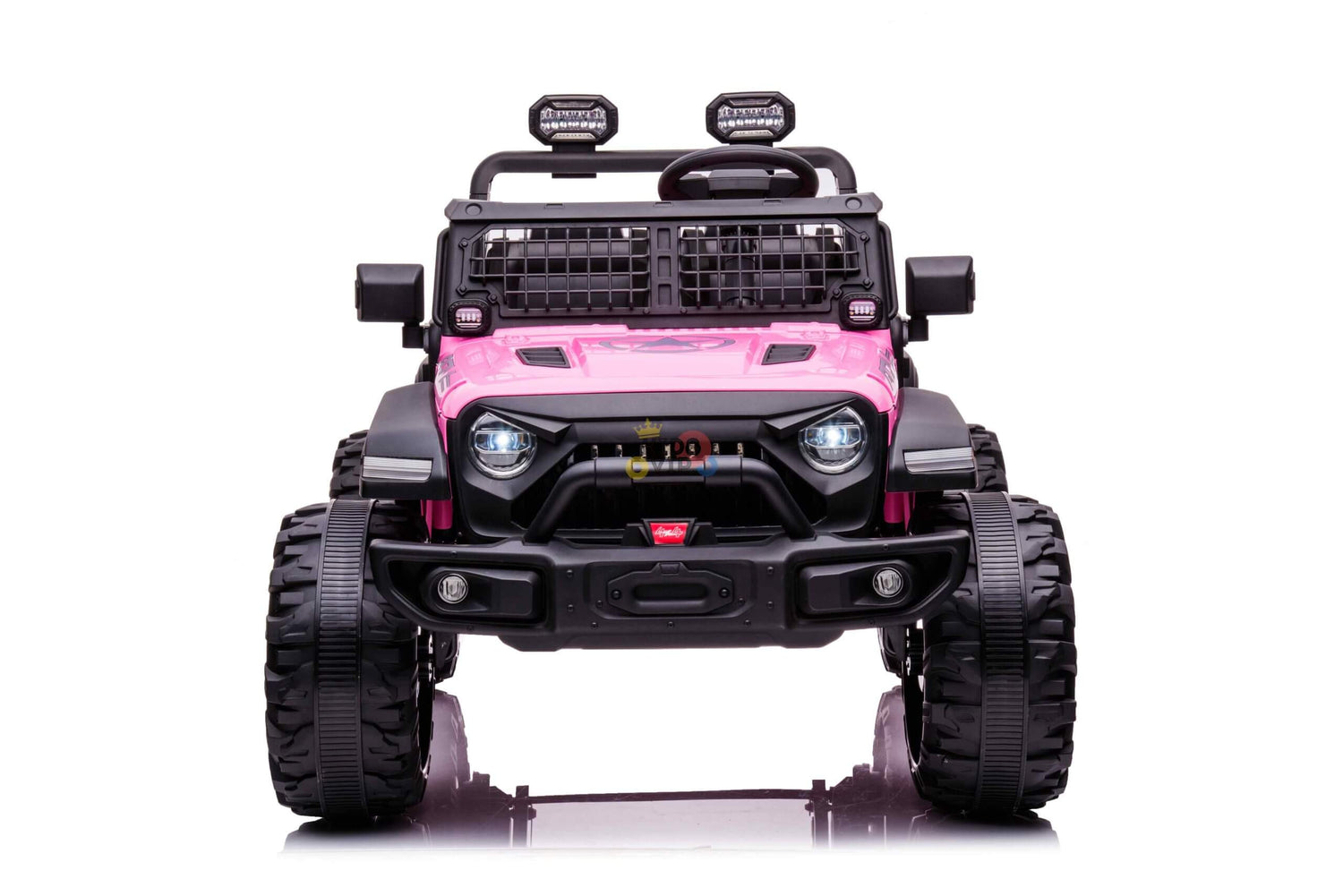 The Pink 24V/4WD Xtreme Ride on Truck, complete with Eva wheels and leather seats, showcases large black tires, a front grille, roof-mounted spotlights, and a sturdy bumper. Designed for kids play with rugged charm and safety features like a parental remote control. The jeep faces forward against a white backdrop.