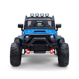 The Blue 24V EVA Big Wheels Kids 1 Seater Upgraded Ride On Truck features a blue body, large rubber wheels, front bull bar with red hooks, four roof lights, and a netted grille design. Pictured facing forward against a white background.