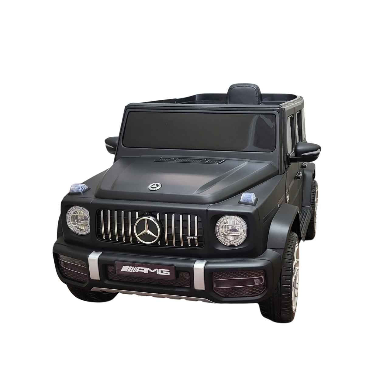 The Limited 12V Matte Edition Mercedes Benz AMG G63 Ride-On Truck for kids features headlights, a detailed grille with the iconic logo, and AMG branding on the bumper, offering upgraded technology for a realistic driving experience.