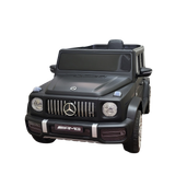 The Limited 12V Matte Edition Mercedes Benz AMG G63 Ride-On Truck for kids features headlights, a detailed grille with the iconic logo, and AMG branding on the bumper, offering upgraded technology for a realistic driving experience.