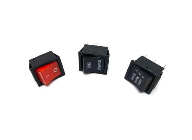 The 12V Mercedes GLS Set of Switches includes three black rocker switches on a white background. The left switch is red with a white O, the center switch says BACK and GO AHEAD, and the right one has labels like RESET and POWER. Ideal for enhancing your ride-on car experience.