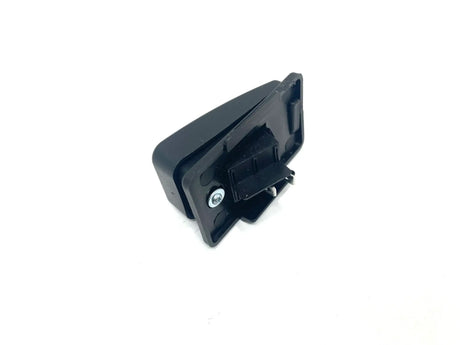 The 12V Mercedes GTR Foot Pedal with Switch, a black rectangular electrical component with a single screw and various connectors, sits against a plain white background, reminiscent of parts in ride-on cars.