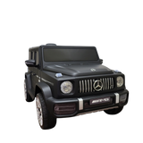 The Limited 12V Matte Edition Mercedes Benz AMG G63 Ride-On for kids and toddlers is depicted with realistic details like front headlights, grille, and logos. Set against a black background, this toy-sized RC truck highlights its sleek design and upgraded technology.