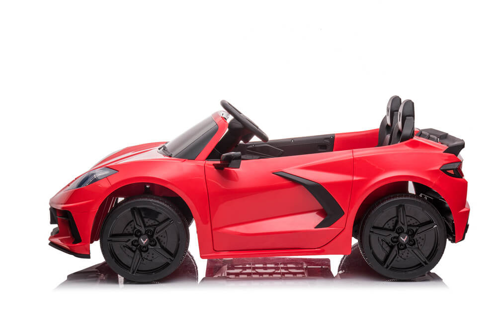 The Kids Premium 24V Red Corvette C8 sports car features a sleek design, remote control, EVA wheels, and leather seats in a dual-seater setup, all against a white background.