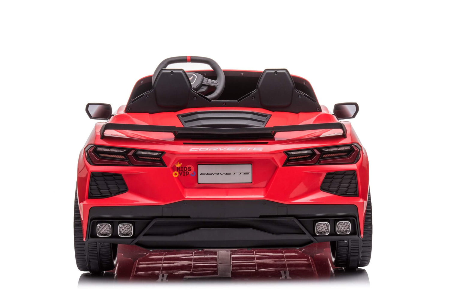 A rear-view image of a red toy resembling a Corvette C8 on a white background features black accents, detailed taillights, visible steering wheel, and Corvette on the license plate. The Kids Premium 24V model offers an exhilarating dual-seater ride with EVA wheels and leather seats.
