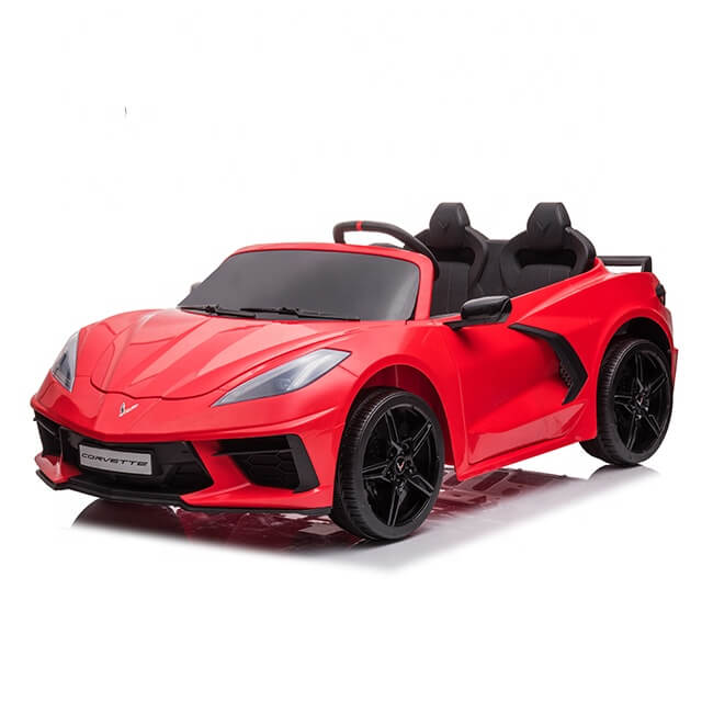 The Kids Premium 24V Red Corvette C8 Dual-Seater features black EVA wheels, leather seats, and front design similar to a classic Corvette, complete with a Corvette license plate and remote control—ideal for young car enthusiasts.