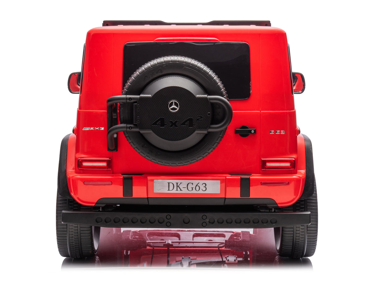 The rear view of the Red 2x24V/4WD Platinum XXL Mercedes G63 Ride On Truck features a 4x4 spare tire cover and DK-G63 on the license plate, offering remote control for thrilling adventures.