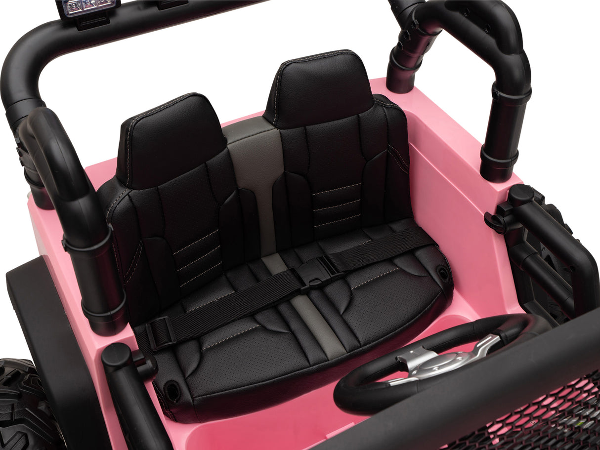 An aerial view captures the Pink 24V EVA Big Wheels Kids Ride On Truck, styled like an off-road vehicle with a black leather-like interior. It features a black steering wheel, seat belts for safety, and is powered by a 24V battery; ideal for kids and toddlers as a 1 seater with rubber wheels and remote.