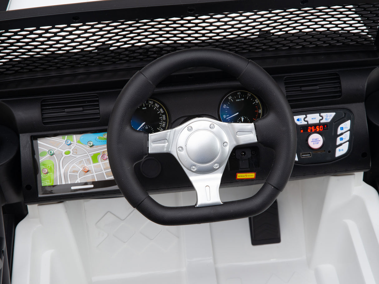 Close-up of the White 24V EVA Big Wheels Kids Ride On Trucks dashboard: It features a steering wheel, digital display with map and buttons. The vibrant graphics shine on screen, and the controls resemble a real vehicle. Its 24V battery guarantees extended playtime adventures.