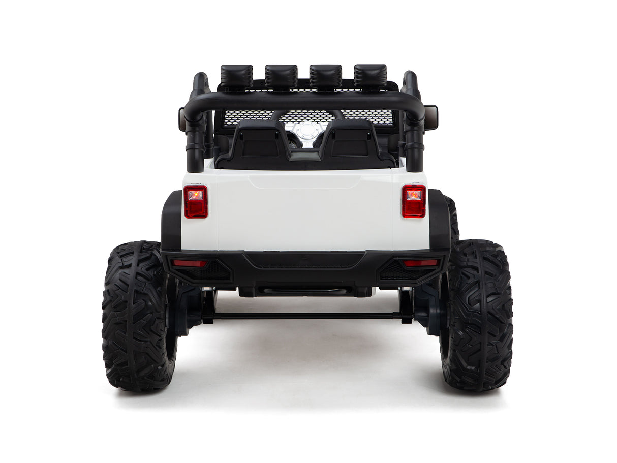 The White 24V EVA Big Wheels Kids 1 Seater Upgraded Ride On Truck features large rubber tires, a roll cage, red tail lights, and a sturdy bumper. Powered by a 24V battery, this remote-controlled vehicle is ideal for childrens outdoor adventures.