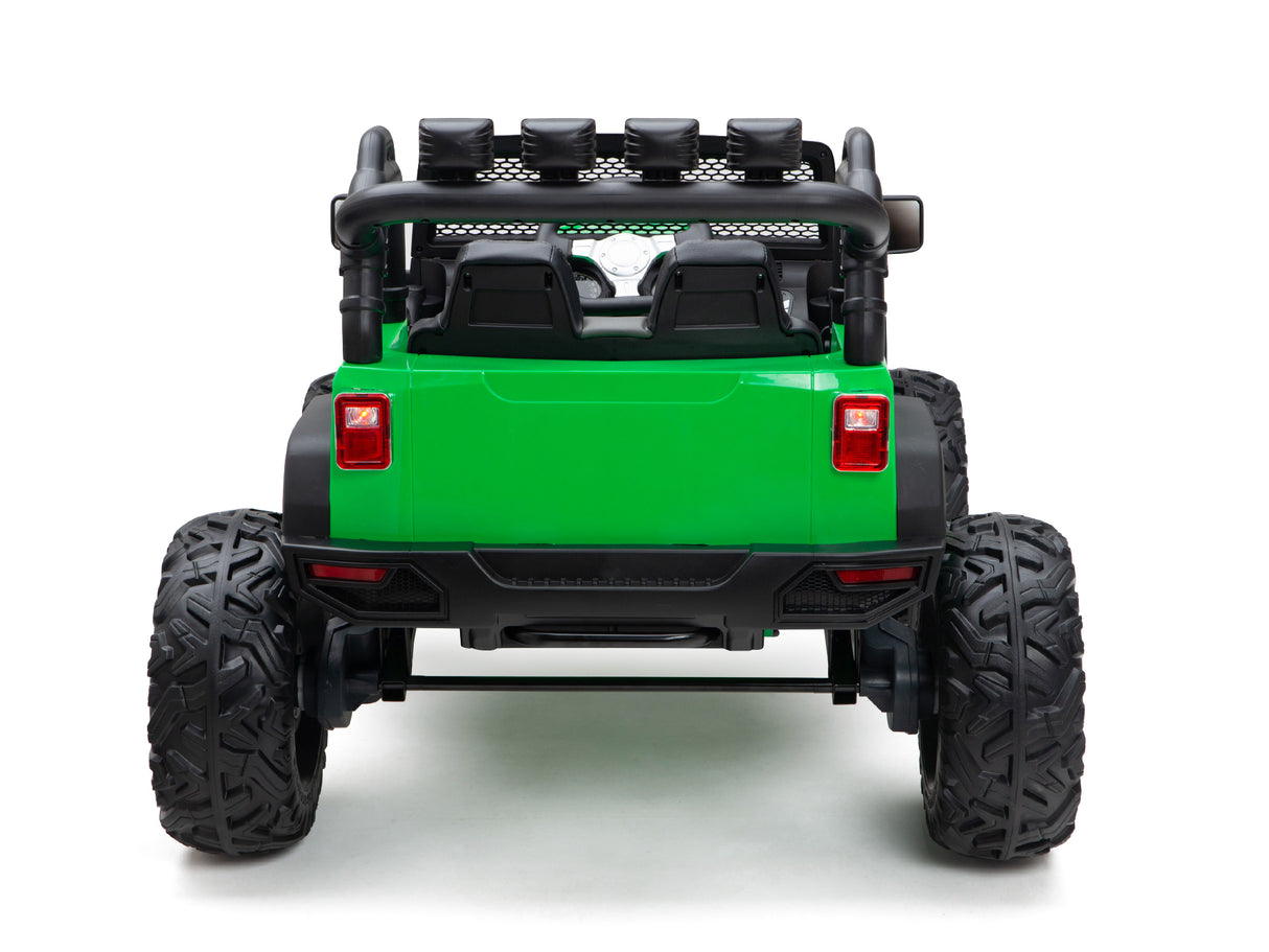 A rear-view of the Green 24V EVA Big Wheels Kids 1 Seater Upgraded Ride On Truck shows its large black rubber wheels, black roll bars, and steering wheel. This adventure-ready toy features a powerful battery and is set against a plain white background.